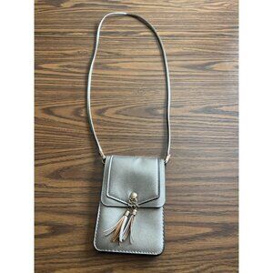 Crossbody bag with tassels and clear cell phone pouch